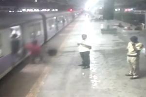 Watch Video: Man falls off Mumbai local train, alert cops save his life