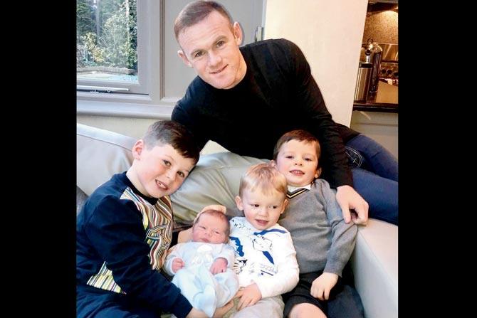 Wayne Rooney with his sons