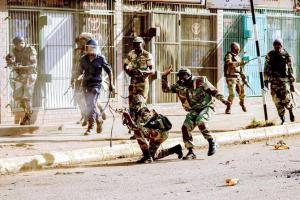 Zimbabwe warns of crackdown after protests