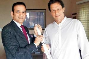 Indian envoy gifts Imran Khan a bat signed by Men in Blue