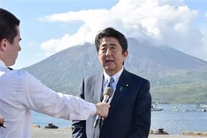 Japan's Shinzo Abe seeks fresh term as party head, record tenure as PM