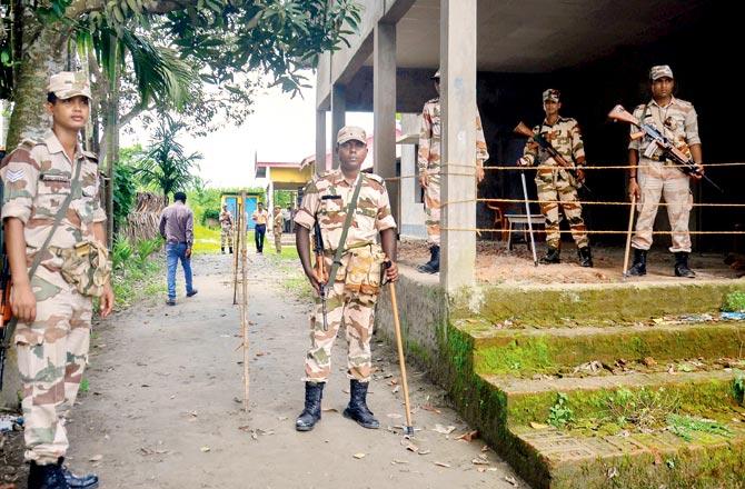  Standing guard at the NRC Seva Kendra at Goroimari after the release of the NRC in Assam. Pic/PTI