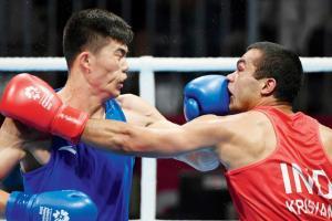 Asian Games 2018: Boxer Vikas punches his way into history; Amit in semis
