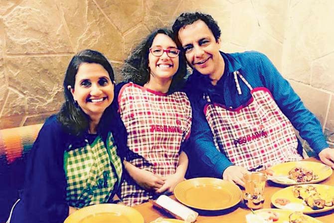 Zuni with her parents