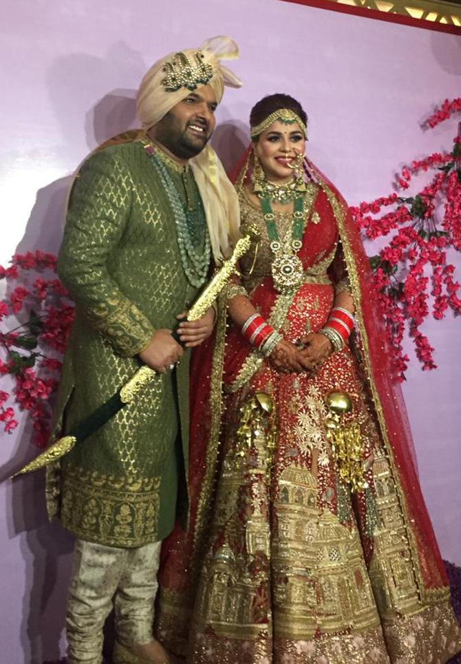 Kapil Sharma sported a green sherwani, with string adding some drama to his look. His triple kalgi on the turban and sword grabbed attention, as did his bearded look.