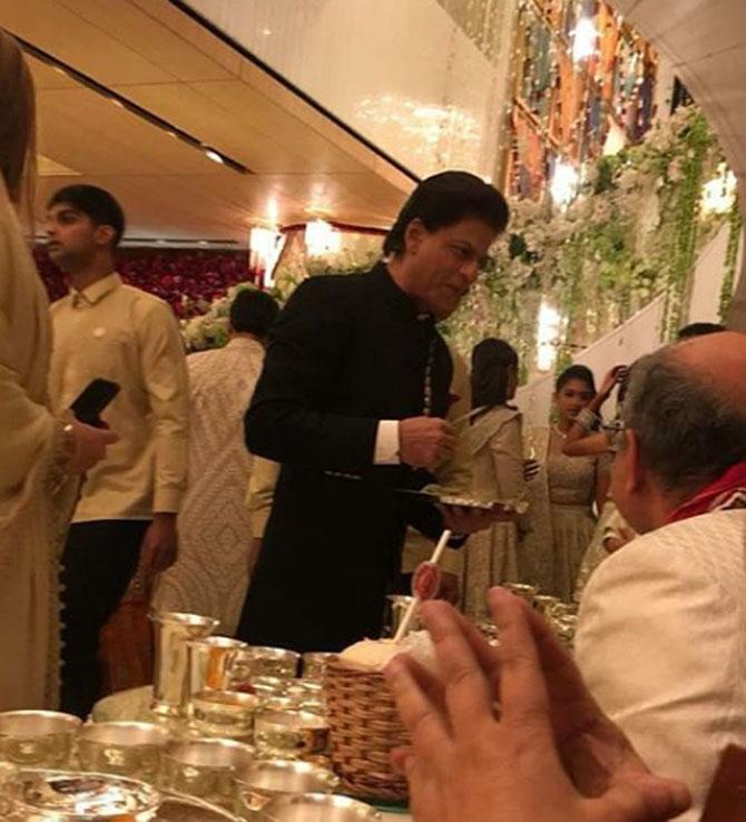 King of romance Shah Rukh Khan was also part of serving ritual. The B-Town celebrities were seen serving traditional Gujarati dishes such as the dhokla among others. Post-wedding, Abhishek Bachchan revealed why celebrities were serving food to the guests. In a tweet, the junior Bachchan said, It is a tradition called 'Sajjan ghot'. The bride's family feeds the groom's family.'