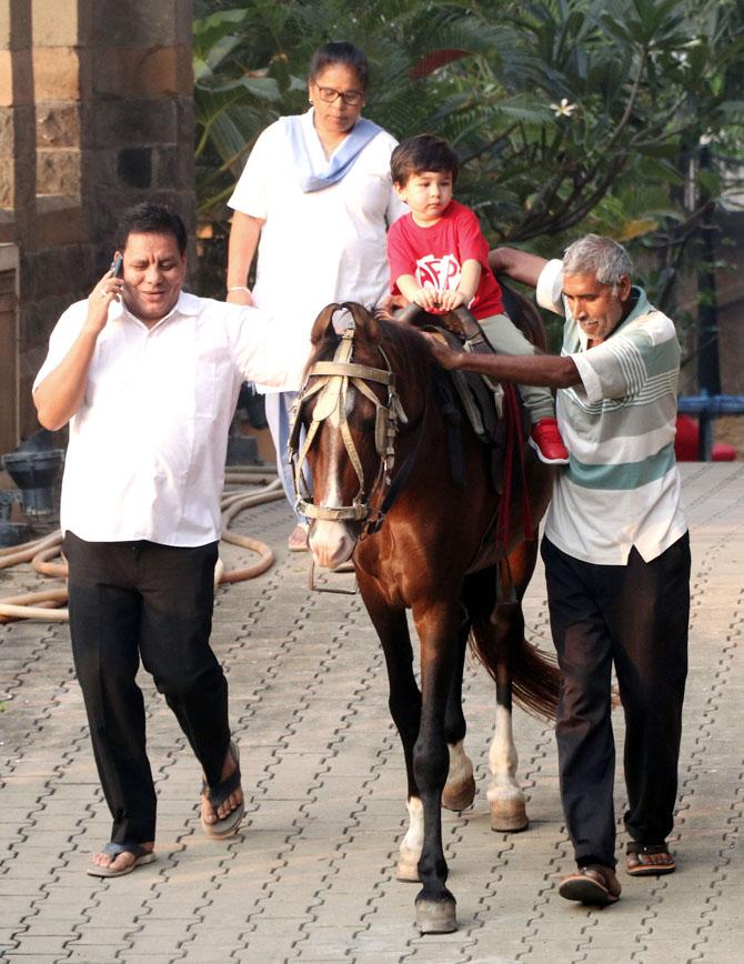 Taimur Ali Khan was spotted at taking horse ride as he was out for a stroll with his nanny in Bandra, Mumbai. All pictures/Yogen Shah