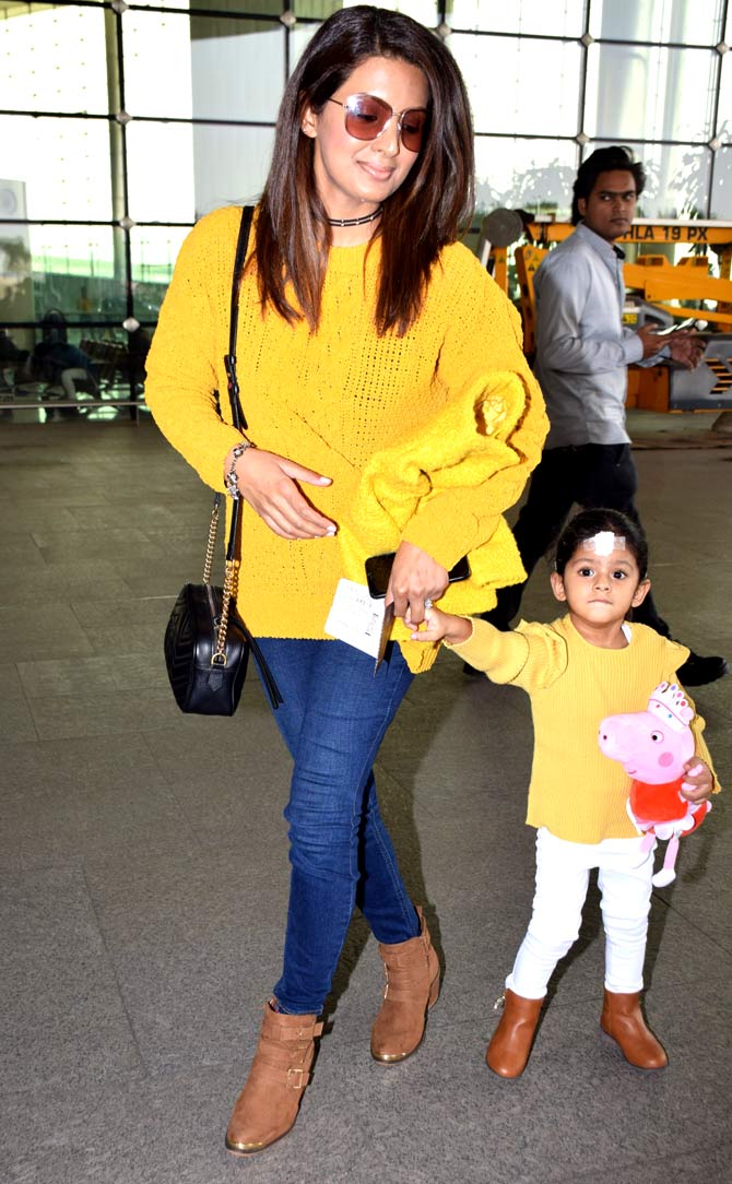 Geeta Basra and daughter Hinaya Heer were twinning in yellow as they were clicked at the Mumbai airport.