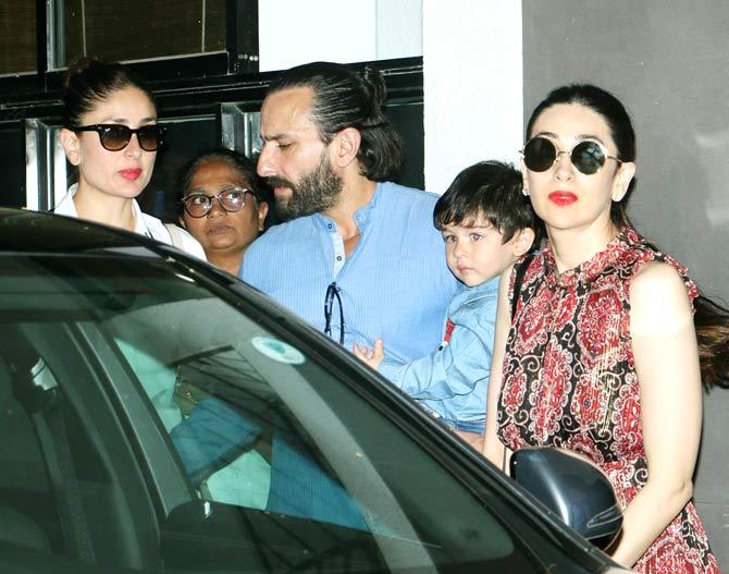 Karisma Kapoor posted two more photos which had her posing with Kareena, Saif and the entire Kapoor family. In picture: Saif Ali Khan with Taimur, Kareena and Karisma Kapoor at Kunal Kapoor's home.