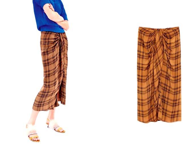 An international retail company, which deals in clothing and accessories, introduced 'check mini skirt' that had an uncanny resemblance to traditional Indian lungis. The sarong-style skirt was being sold at Zara's UK online store at 69.99 pounds, which is equal to more than Rs 6,250. A sarong is typically worn by men around their waist in India and South East Asian countries, like Singapore, Malaysia, Sri Lanka, Pakistan, Bangladesh, Nepal, Thailand and Myanmar. The clothing giant described the item as a 'flowing skirt with draped detail in the front, slit detail at the hem. Zip fastening in the back hidden along the seam.'