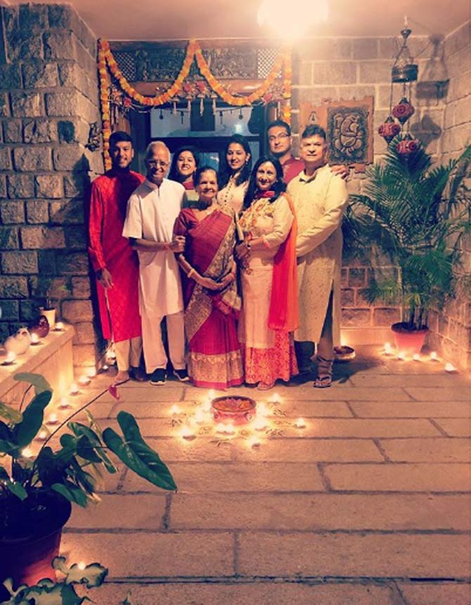 Mayank Agarwal posted this picture of himself with his family on the occasion of Diwali. The decorations of the festival, outside Mayank Agarwal's house cannot go unnoticed in this picture.