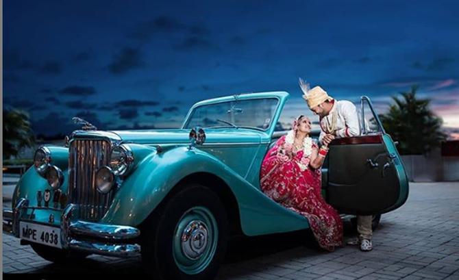 Mayank Agarwal has played 9 Tests for India with 872 runs at an average of 67.07. Mayank Agarwal posted this dreamy picture from his wedding photoshoot. The married couple Mayank Agarwal and Ashita Sood look gorgeous in their wedding attire in a vintage convertble car.