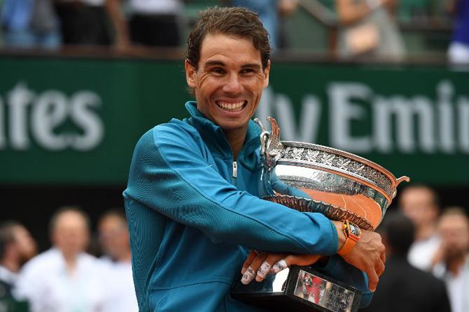 Rafael Nadal Is The King Of Clay, Bags 11th French Open Crown: Rafael Nadal roared to French Open title number 11 with a straight-set demolition of Dominic Thiem. The Spaniard continued his extraordinary domination at Roland Garros with a ruthless 6-4, 6-3, 6-2 victory. Seventh seed Thiem is the only player to have beaten Nadal on clay in the past two years, and he claimed he had a plan to thwart the Spaniard in Paris. But once a competitive first set went the way of the world number one, the plan became damage limitation and Nadal's 'undecima' never looked in any doubt. 