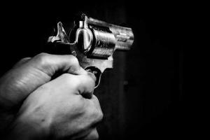Five men loot Rs 13 lakh from bank at gunpoint