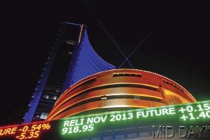 Sensex, Nifty end flat; rupee loses 80 paise
