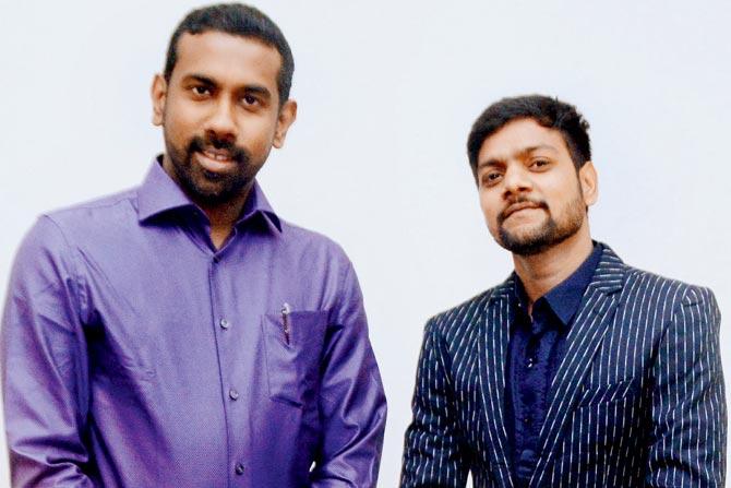 Founder of Rise Design Art (left) Arun Cherian and artist Sanjay Kumar