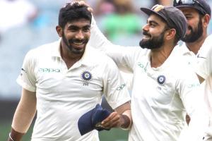 Indias captain Virat Kohli, right, celebrates Jasprit Bumrah, left, after Bumrah got the wicket of Australias Shaun Marsh during play on day three of the third cricket test between India and Australia in Melbourne, Australia, Friday, Dec. 28, 2018. Pic/AP