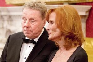 England footie boss Harry Redknapp in tears after reunion with wife
