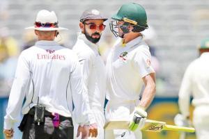 Captains Kohli, Paine get verbal and call for umpires warning
