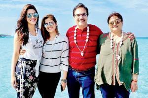 Kriti Sanon is on a family vacation and her beachy affair is envious