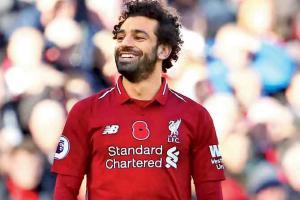 EPL: Salah hat-trick sends Liverpool on top