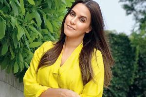 New mother Neha Dhupia back to work in less than 15 days after delivery