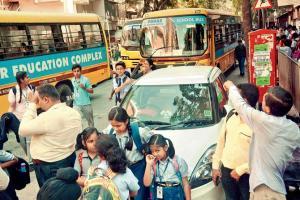 School buses squeeze traffic into single lane at RN Podar school