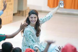 This is how Jacqueline played Santa Claus for the orphanage children