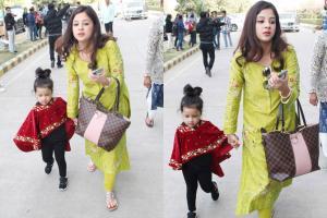 Sakshi Dhoni has her hands full managing daughter Ziva at Udaipur airport