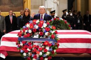 Donald Trump pays respects to late president George Bush at US Capitol
