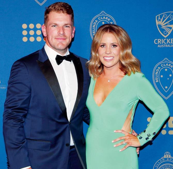 Aaron Finch and Amy Griffiths. PIC/Getty Images