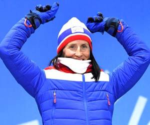 Norway's Marit Bjoergen equals Winter Olympics medal record of 13