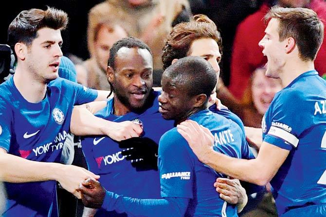 Chelsea players celebrate a goal against West Brom during an English Premier League encounter on Monday. Pic/AFP 