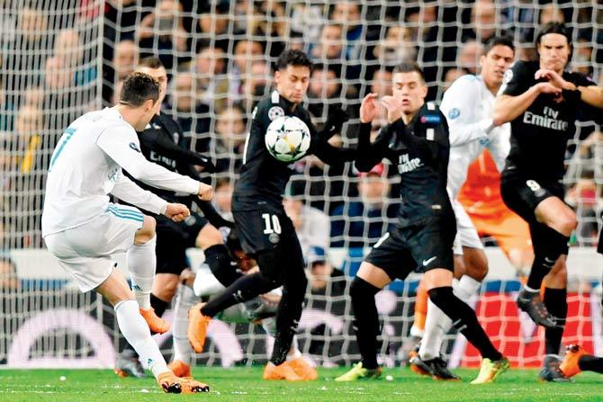Cristiano Ronaldo shoots from a penalty spot during Real Madrid