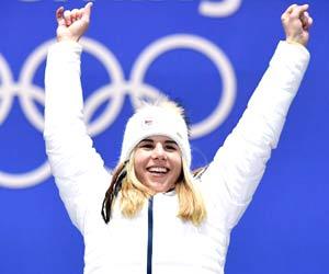 Czech snowboarding specialist earns stunning win in women's Super-G skiing