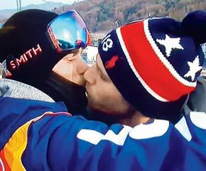 Freestyle skier Gus' gay kiss heats up Winter Olympics