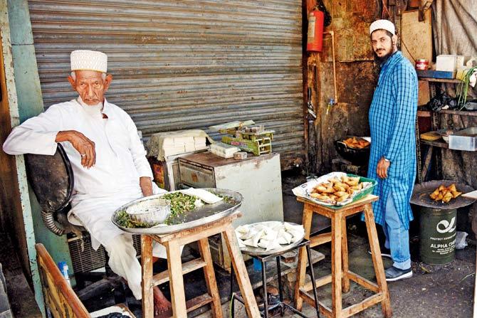 At their Diamond Samosawala shop, Hakimuddin and his son Burhanuddin have sold samosa pattis for 65 years, along with assorted kebabs, cutlets and kachoris
