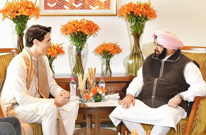 Canadian Prime Minister Justin Trudeau meets Punjab Chief Minister Amarinder Singh. Pic/AFP