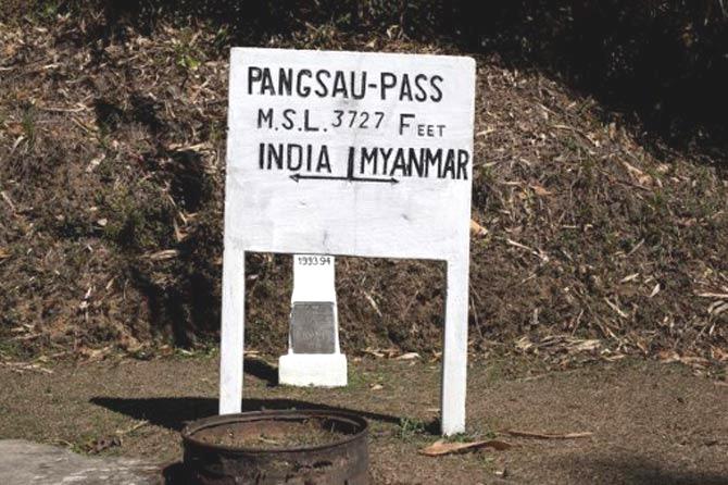 India-Myanmar border: This photograph taken on February 19, 2014, shows a sign on the border between Myanmar and India at Pangsau Pass, Saigang State, Northern Myanmar