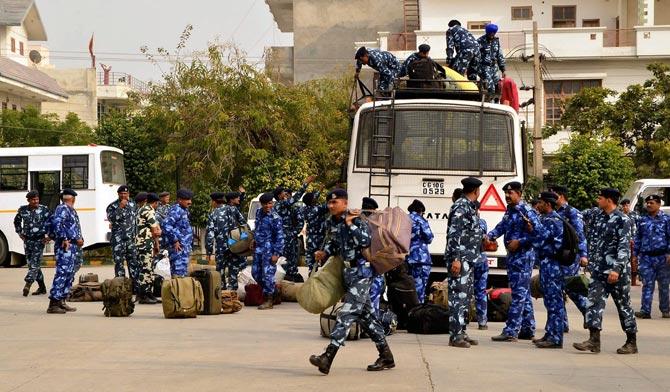 Paramilitary jawans arrive in Rohtak, Haryana on Sunday, ahead of BJP president Amit Shah