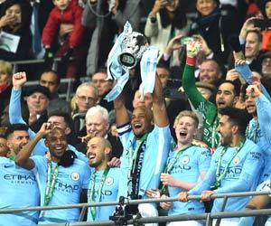Manchester City beat sorry Arsenal 3-0 to win League Cup title