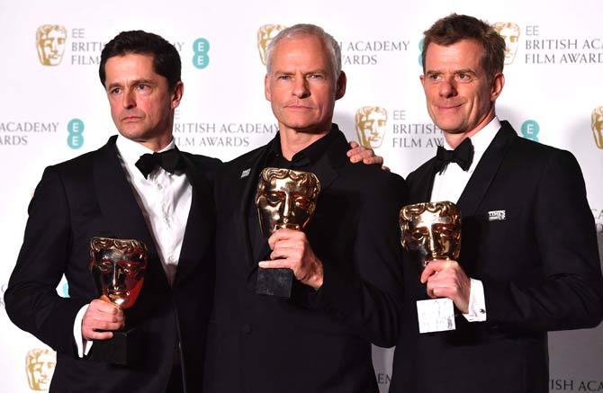 Producer Peter Czernin (L), British-Irish filmmaker Martin McDonagh (C) and British producer Graham Broadbent (R) pose with their awards for an Outstanding British Film for the film