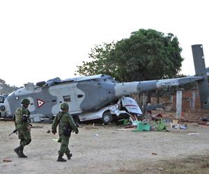 13 killed in helicopter crash after Mexican quake