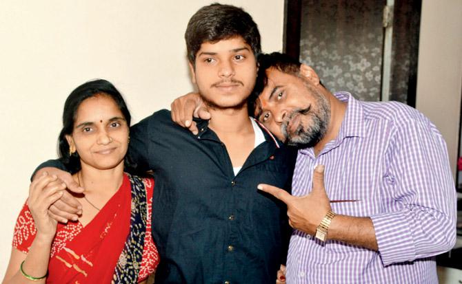 Aniket with his parents Babita and Rajendraprasad Tiwari