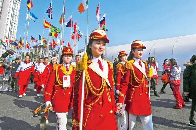 Cheerleaders leave after a welcoming ceremony for North Korea’s Olympic team in Gangneung on Thursday. Pic/AFP