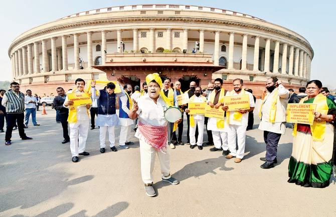 TDP MP N Sivaprasad and other members from Andhra protested in Parliament yesterday. Pic/PTI