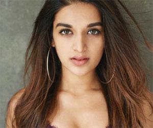 Nidhhi Agerwal goes bold in purple lingerie
