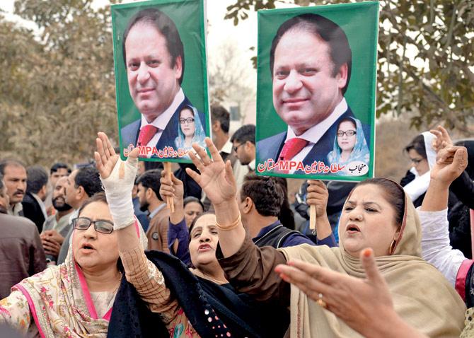 Supporters of ousted Pakistani Prime Minister Nawaz Sharif shout slogans against the Supreme Court verdict outside an accountability court in Islamabad on Thursday. Pic/AFP