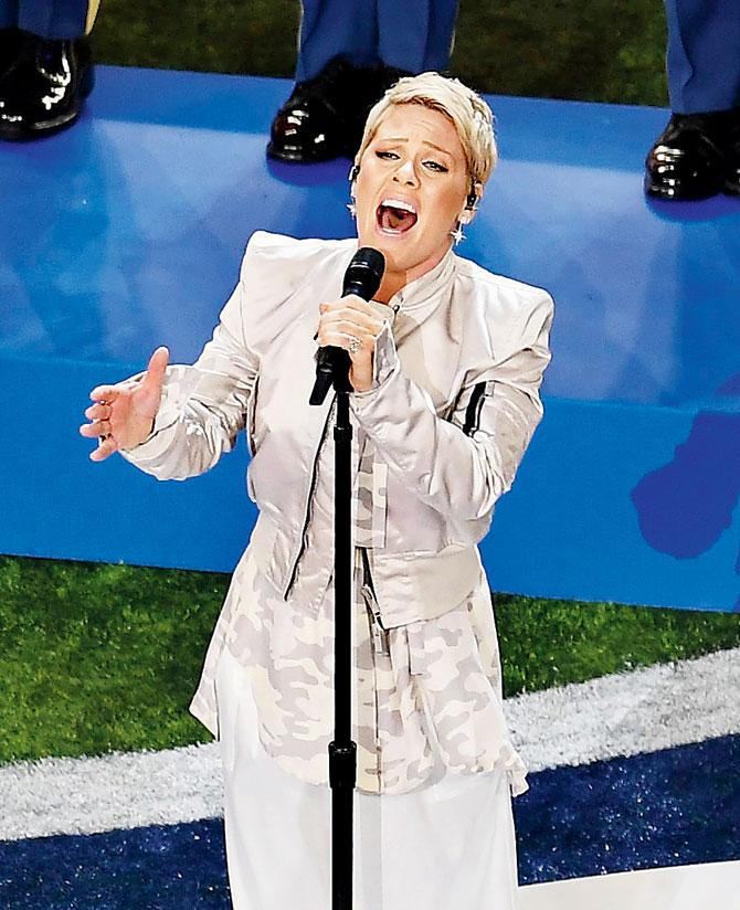 Pink sings the US national anthem before the start of the Super Bowl in Minneapolis on Sunday. Pic/AFP