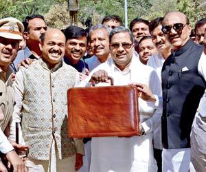 Karnataka CM Siddaramaiah announces free LPG, health scheme in budget